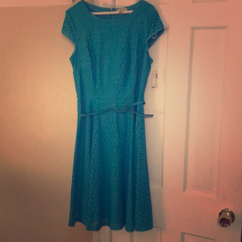 Green fit and flair dress with belt